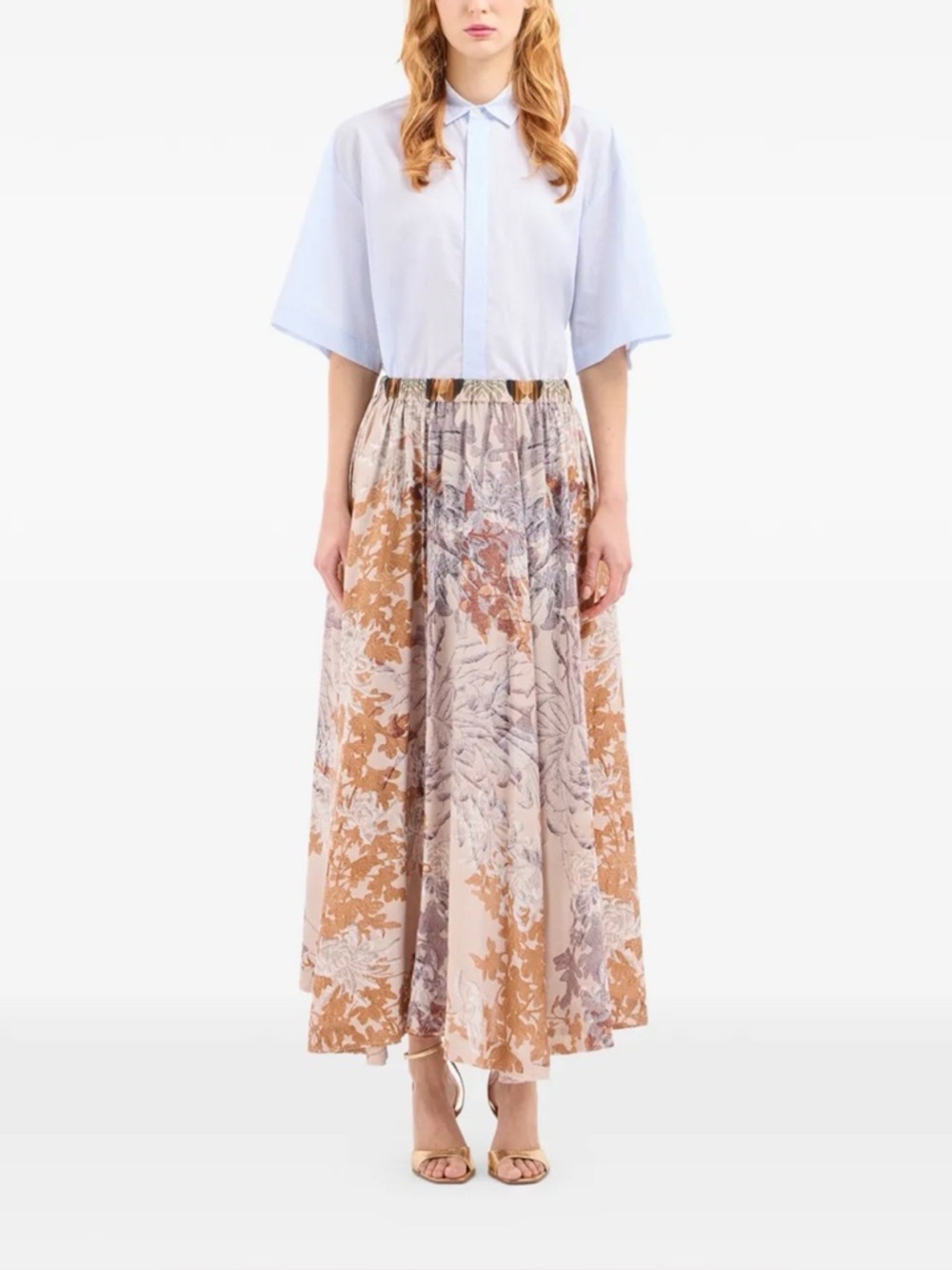 Vintage-style floral print maxi skirt in shades of orange and brown.